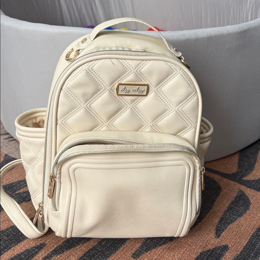 Itzy Ritzy Quilted Cream Backpack